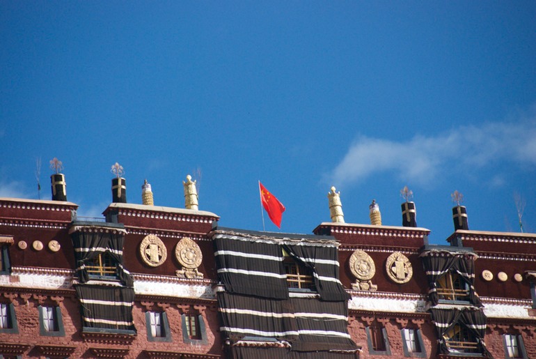 Chinese Flag over Potala Palace