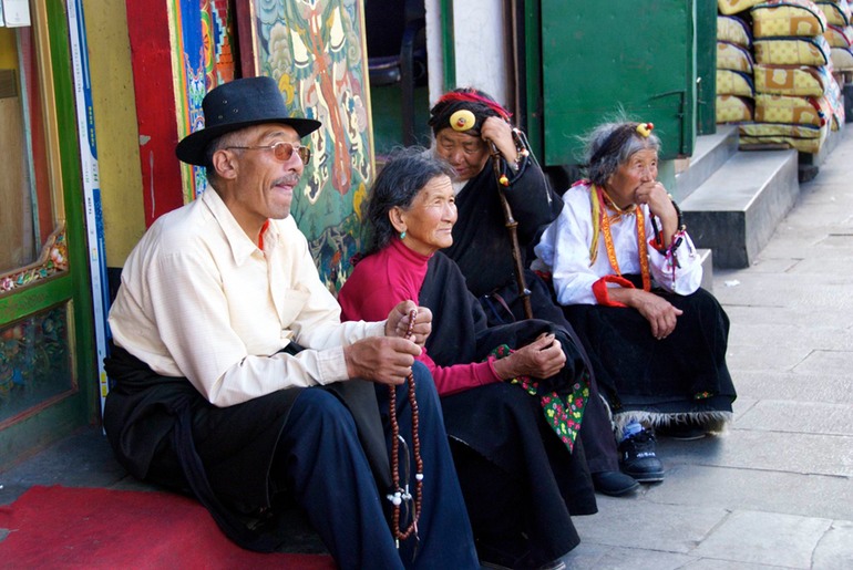 Family Resting on Barkhor Street